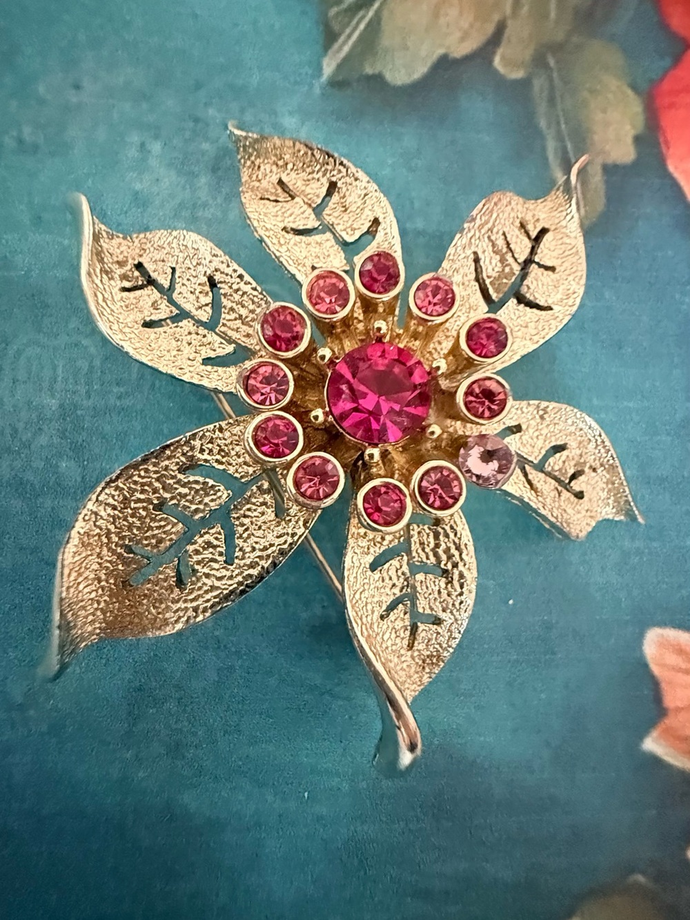 Gold-Tone Floral Brooch with Pink Gem Accents